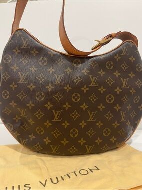 Live show listing.
Louis Vuitton Monogram Croissant Shoulder Bag